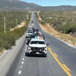 Escolta Guardia Estatal caravana de 250 vehículos de paisanos en la Carretera Federal 101